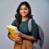 A-girl-with-a-backpack-and-a-book-that-says-she-is-smiling-_-Premium-AI-generated-image-1.jpg